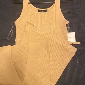 Two piece tank top and skirt with slit in the back